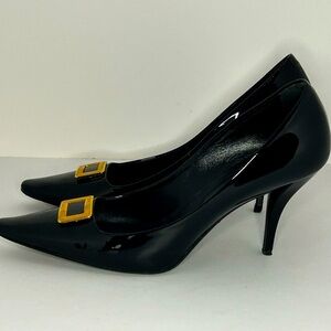 Roger Vivier black patent pumps.